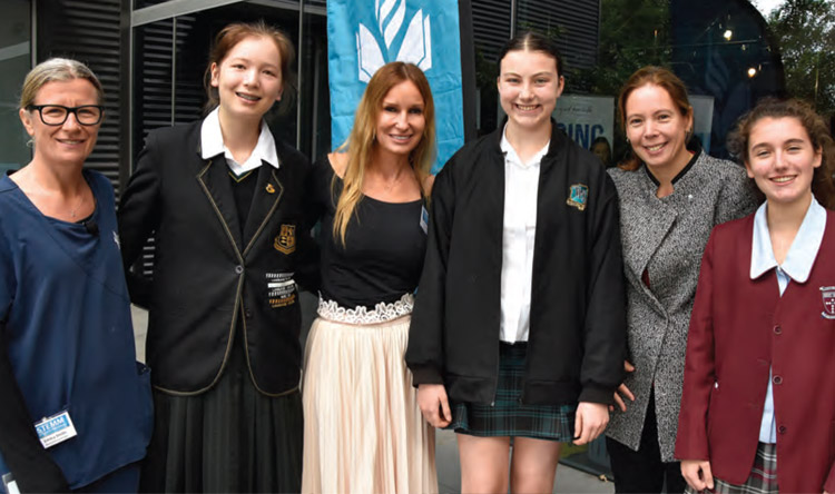 San medical and nursing staff with local students